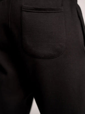 Pants Classic noir Piraterie Officielle – coupe droite intemporelle avec logo Wave imprimé, style urbain discret