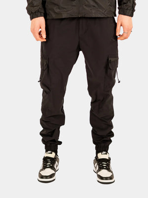 Pantalon Cargo Wave La Piraterie – coupe relax avec poches fonctionnelles, chevilles élastiquées et logo Wave imprimé